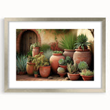 Botanical wall art featuring a collection of colorful succulent designs in a silver frame with matting, perfect for home decor and nature-inspired aesthetics.