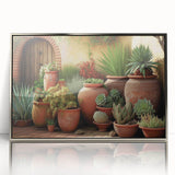 Framed wall art featuring an elegant botanical design of succulents, displayed in a sleek silver frame, perfect for modern home decor and plant lovers.