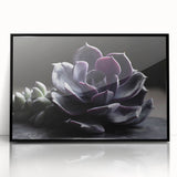 Framed wall art featuring a botanical design of colorful succulents, set in a sleek black frame, perfect for enhancing modern home decor.