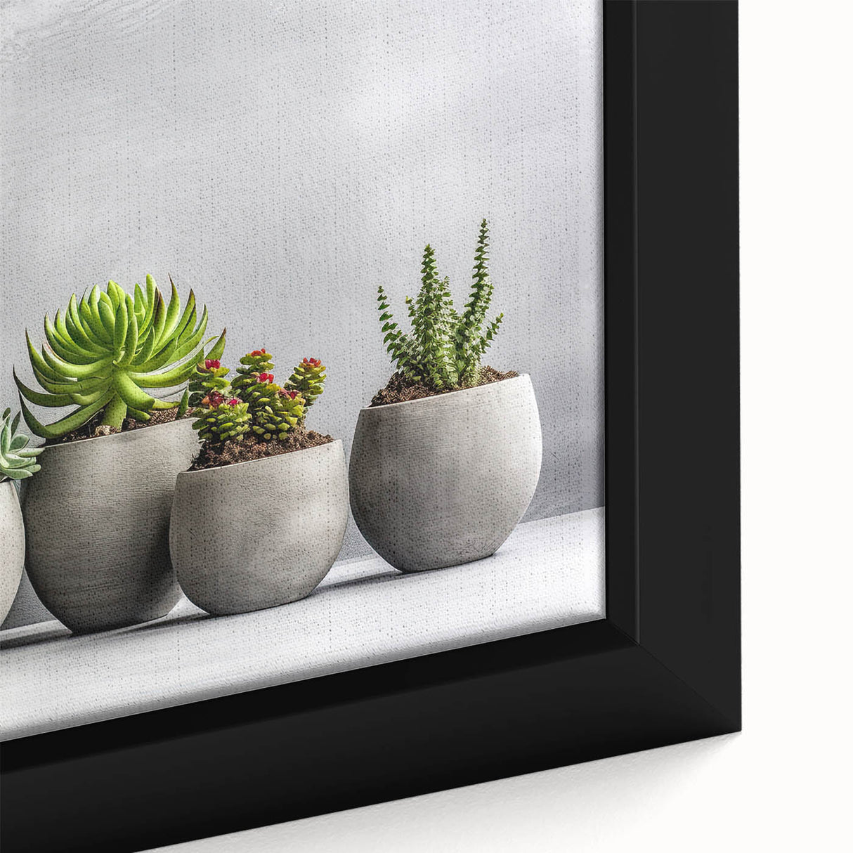 Close-up of a beautifully framed botanical wall art piece showcasing vibrant succulents and floral designs, perfect for adding a touch of nature to home decor.