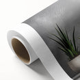 Rolled canvas showcasing a vibrant botanical design featuring an array of colorful succulents, expertly printed for wall art decor, ideal for nature enthusiasts.