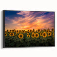 Framed wall art featuring a botanical sunflower design on canvas, showcasing vibrant yellow petals with a black frame, perfect for home decor.