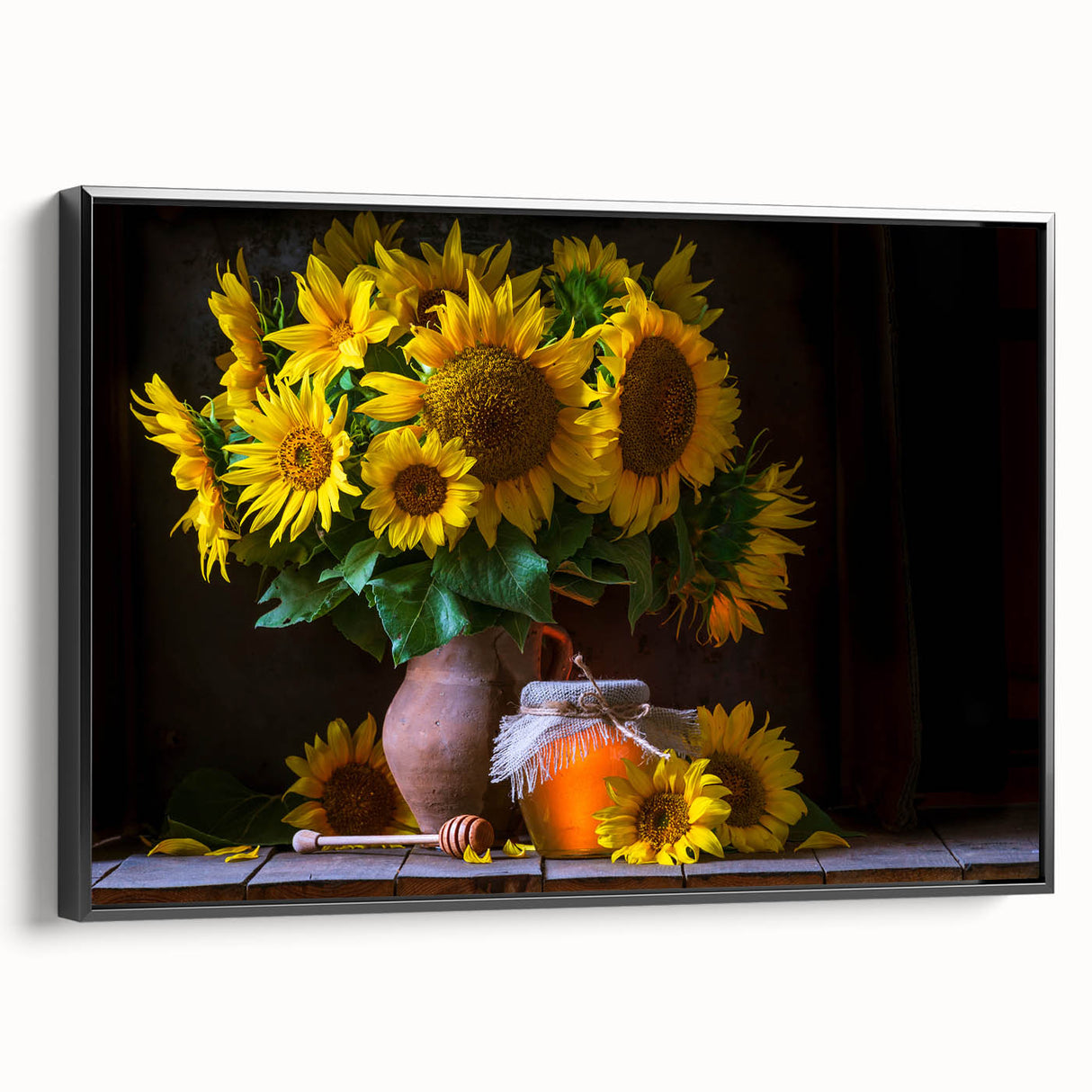 Framed canvas wall art showcasing a vibrant botanical sunflower design, featuring a sleek black frame and side view perspective, ideal for home decor enhancement.