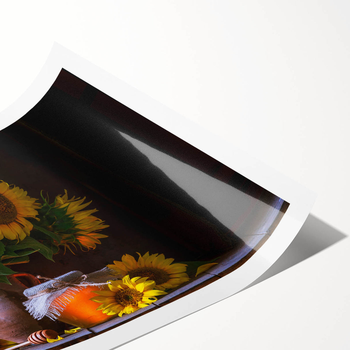 Vibrant sunflower botanical print showcasing rich yellow petals against a soft blue background, rolled for easy display, ideal for home decor or gift.