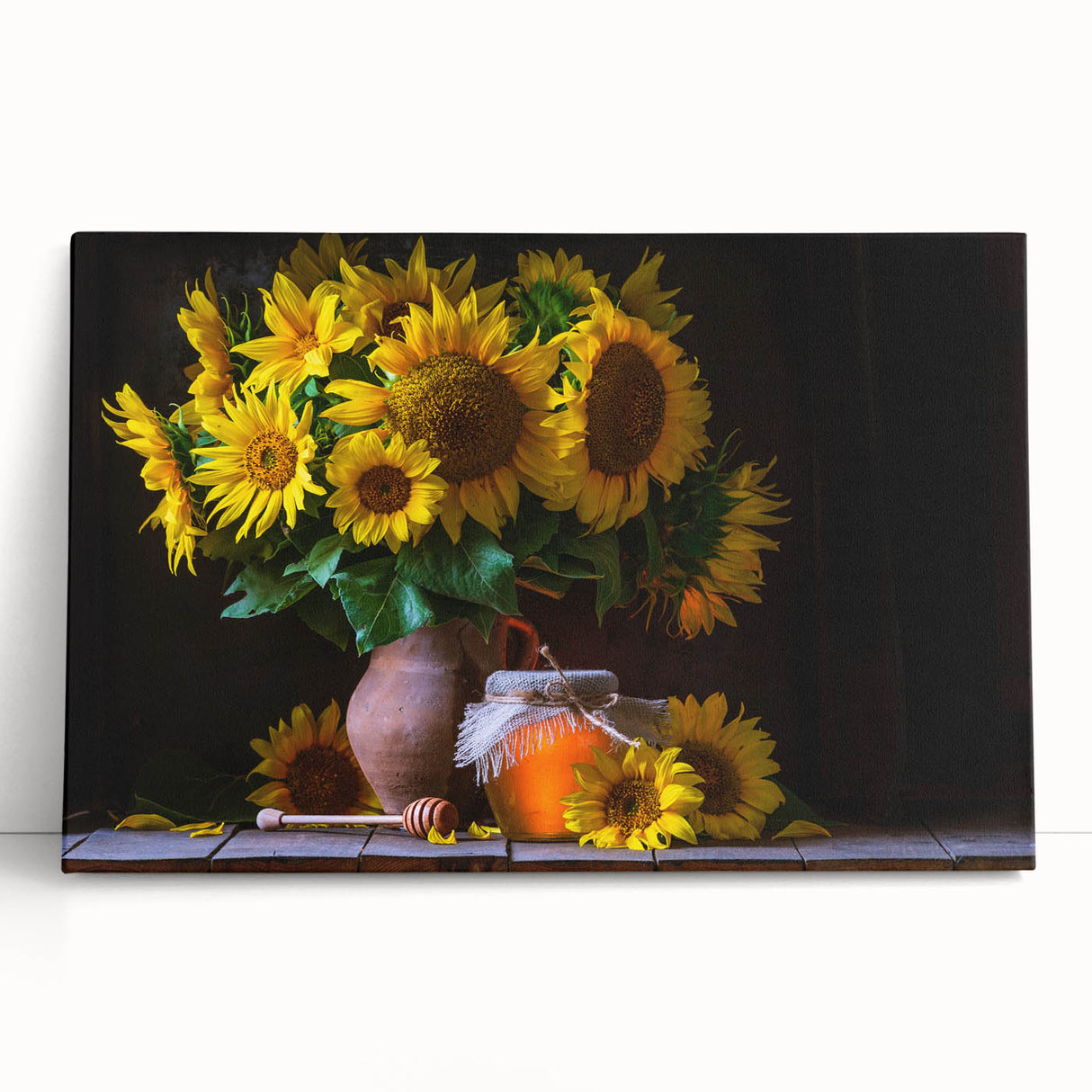 Vibrant botanical wall art featuring a detailed sunflower design on stretched canvas, leaning against a neutral wall, enhancing any home décor with its vivid colors and natural aesthetic.