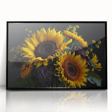 Framed acrylic wall art showcasing a vibrant botanical sunflower design with a sleek black frame, perfect for adding a cheerful touch to home decor.