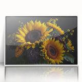 Framed acrylic wall art featuring a vibrant botanical sunflower design, showcasing bright yellow petals and detailed green leaves, ideal for home decor.