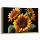 Framed canvas artwork showcasing a botanical sunflower design with vibrant yellow petals and a gold frame, perfect for home decor. Ideal for adding a touch of nature to any room.