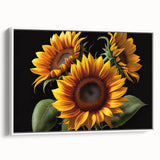 Framed canvas wall art featuring a vibrant botanical sunflower design, showcasing detailed yellow petals and green leaves, set against a white background for a modern touch. Ideal for brightening up living spaces or adding a nature-inspired accent to home decor.