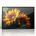 Framed wall art showcasing a vibrant botanical sunflower design with a sleek black frame, ideal for brightening up home decor or office spaces. The acrylic finish enhances the vivid colors and intricate details of the sunflowers, making it a perfect focal point for any room.
