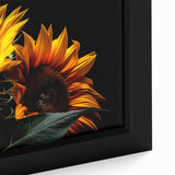 Close-up of a framed canvas wall art featuring a vibrant sunflower design with intricate botanical details, perfect for home decor, bringing warmth and nature indoors.
