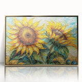 Framed botanical wall art featuring a vibrant sunflower design, accented with gold framing, perfect for brightening home decor and adding a touch of nature.