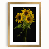 Botanical wall art featuring a vibrant sunflower design framed in elegant gold, showcasing intricate details and a mat border, perfect for home decor.