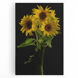 Stretched canvas wall art showcasing a vibrant sunflower botanical design, with rich yellow petals and green leaves, perfect for brightening any room decor.