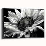 Framed canvas wall art showcasing a botanical sunflower design against a black background, emphasizing vibrant yellows and deep contrasts, perfect for home decor.