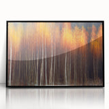 Framed botanical wall art showcasing a detailed design of vibrant flowers and trees, featuring a sleek black frame and acrylic finish for a modern aesthetic.