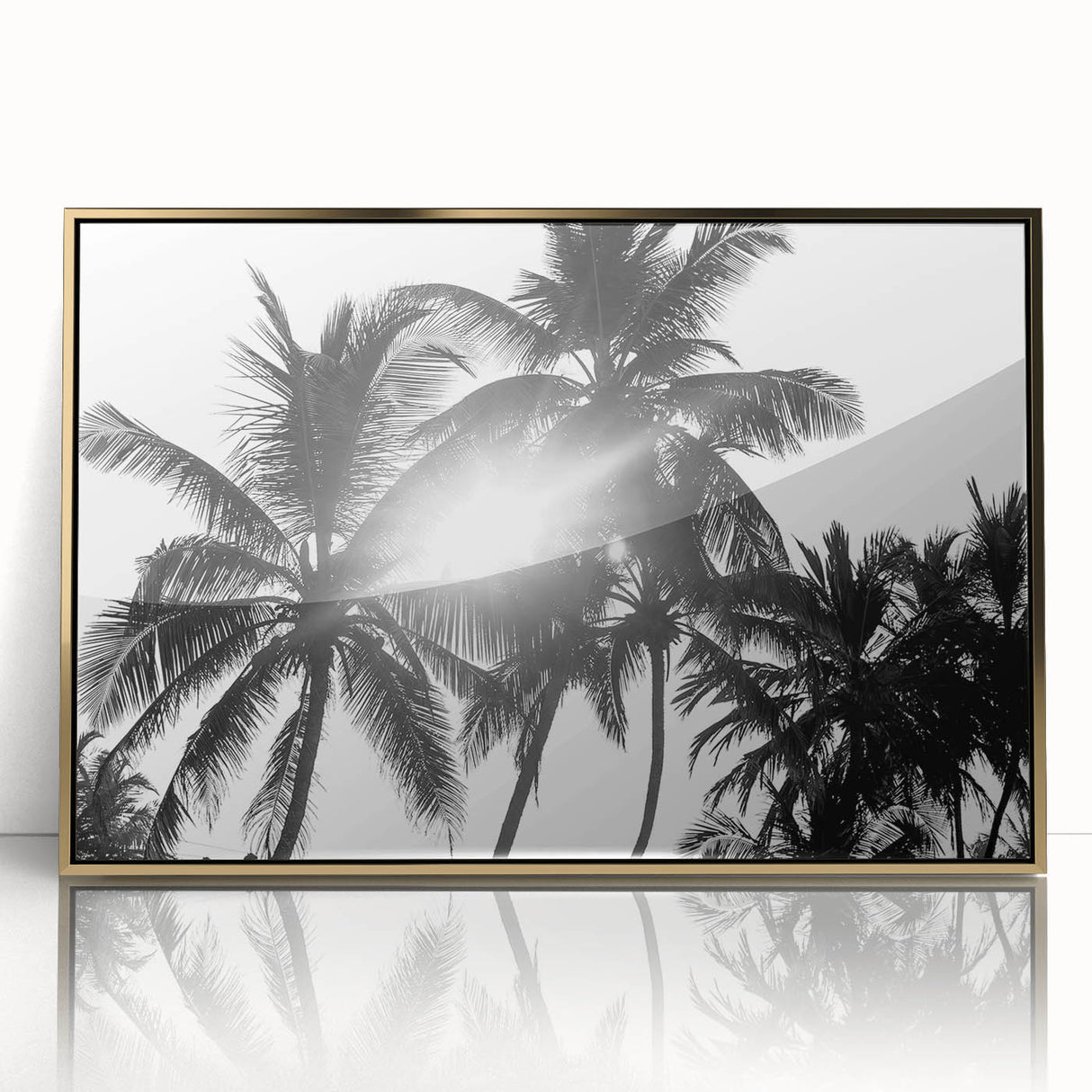 Framed botanical wall art featuring a vibrant design of flowers and trees, set in a sleek gold frame, ideal for adding elegance to home decor.