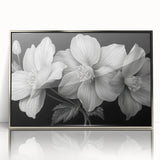Framed wall art featuring a vibrant botanical design of tropical flowers in a silver-acrylic frame, perfect for enhancing modern home decor.