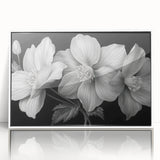Framed wall art showcasing a vibrant tropical flower design with lush green leaves and vivid colors, perfect for enhancing modern decor. The acrylic frame adds elegance and depth, making it an ideal piece for botanical enthusiasts.