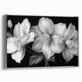 Framed canvas wall art showcasing a vibrant tropical flower design in hues of pink and green, elegantly displayed with a silver frame, ideal for home decor.