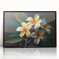 Framed wall art featuring a vibrant tropical flower design with botanical elements, set in a sleek black frame, perfect for enhancing decor in modern interiors.