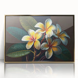 Framed wall art showcasing a vibrant botanical tropical flower design with a gold frame, perfect for adding a touch of elegance to home decor.