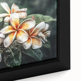 Close-up of a vibrant, framed botanical tropical flower design featuring lush green leaves and colorful blooms, ideal for enhancing home decor with a natural touch.