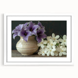 Tropical botanical wall art featuring vibrant floral designs in a white frame with a mat, ideal for enhancing modern home decor with a touch of nature.