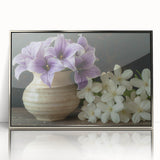 Framed wall art showcasing a vibrant tropical flower design in acrylic, featuring a silver frame that enhances its botanical beauty, perfect for home decor.