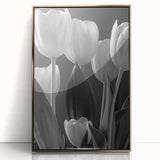 Framed botanical wall art featuring a vibrant tulip design with gold accents, set against a clean white background, ideal for modern home decor.