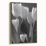 Framed botanical wall art featuring a vibrant tulip design on canvas with a luxurious gold frame, showcasing elegance and nature-inspired decor for home interiors.