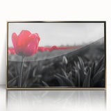 Framed botanical wall art featuring a vibrant tulip design with gold accents. The piece showcases intricate floral details on a textured background, perfect for home decor.