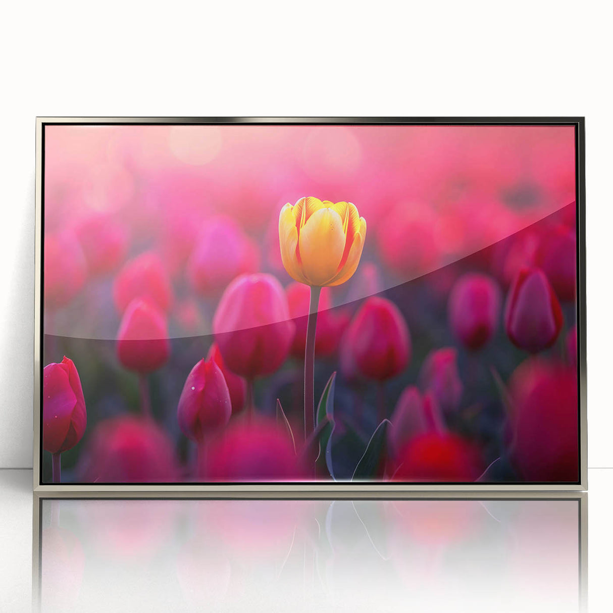 Framed wall art showcasing a botanical tulip design with vibrant colors and a sleek silver frame, perfect for enhancing modern home décor and floral-themed interiors.
