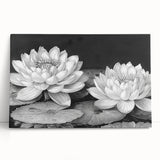 Water lily botanical wall art design on stretched canvas, showcasing vibrant colors and intricate details, leaning against a neutral background, perfect for home decor.