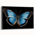 Framed canvas wall art featuring a vibrant butterfly design with intricate details, set against a sleek black frame, ideal for home decor and nature enthusiasts.