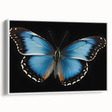 Framed wall art displaying a vibrant butterfly design in a colorful insect and arachnid theme, featuring a white frame and side view, perfect for nature-inspired decor.