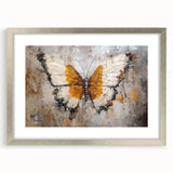 Framed wall art showcasing a colorful butterfly design with intricate insect and arachnid patterns, set in a silver frame with a white mat, ideal for nature-themed decor.