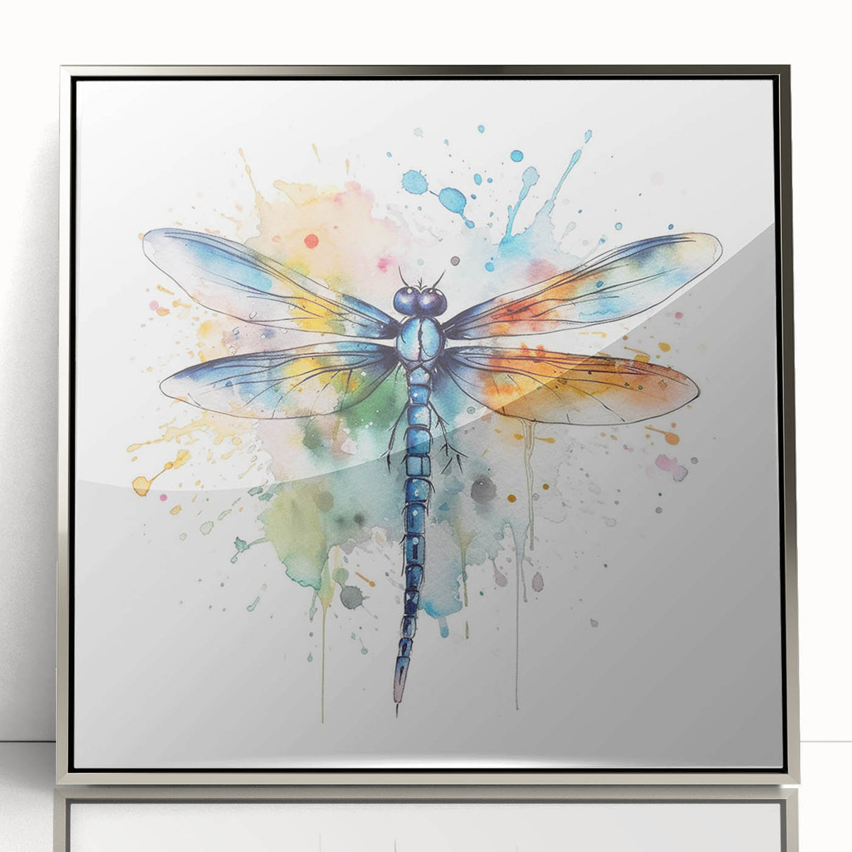 Framed wall art featuring a detailed dragonfly design in vibrant colors, set in a sleek silver frame, perfect for nature enthusiasts and home decor.