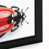 Close-up view of a framed wall art piece showcasing a vibrant ladybug design, featuring intricate details and bright colors on canvas, ideal for nature-inspired decor.