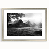 Framed wall art collection featuring a scenic landscape of rustic barns, elegantly displayed with a silver mat and frame, enhancing home decor aesthetics.