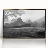 Framed acrylic wall art showcasing a serene landscape with a rustic barn, highlighted by gold accents, perfect for enhancing home decor aesthetics.