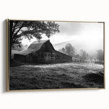 Framed canvas wall art featuring a picturesque landscape with a rustic barn, accented by a gold frame. Ideal for home decor, this piece adds warmth and charm to any space.