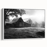 Framed canvas wall art showcasing a picturesque white barn landscape, designed for home decor. The artwork features vivid greens and blues, evoking tranquility and rustic charm.