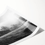 Rustic landscape wall art print showcasing a vibrant barn scene with rolling hills and a colorful sunset, ideal for home decor enthusiasts seeking countryside charm.