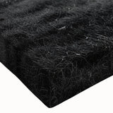 Close-up of a stretched canvas featuring a vibrant landscape design with a rustic barn, showcasing rich colors and intricate details, ideal for home decor.