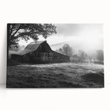 Stretched canvas wall art showcasing a serene landscape with rustic barns and lush greenery, perfect for enhancing home decor and bringing a touch of nature indoors.