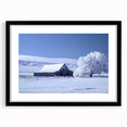 Framed wall art showcasing a rustic barn landscape design, featuring a black frame with a mat for an elegant finish, ideal for home decor.