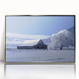 Framed acrylic wall art showcasing a serene landscape with a rustic barn, accented by silver framing, perfect for home decor. Ideal for nature enthusiasts and rustic-themed interiors.