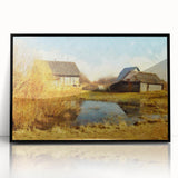Framed acrylic wall art featuring a picturesque rural landscape with a red barn surrounded by lush greenery, ideal for home decor enthusiasts seeking nature-inspired designs.