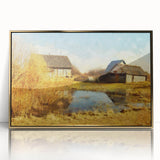 Framed acrylic wall art showcasing a scenic landscape with a rustic barn, accented by a gold frame, ideal for enhancing home decor with a touch of elegance.